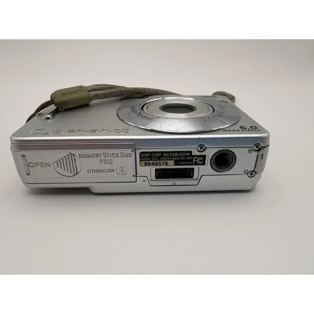 Sony Cyber-shot DSC W50 6.0MP Silver Digital Camera Bundle For Parts Not Working